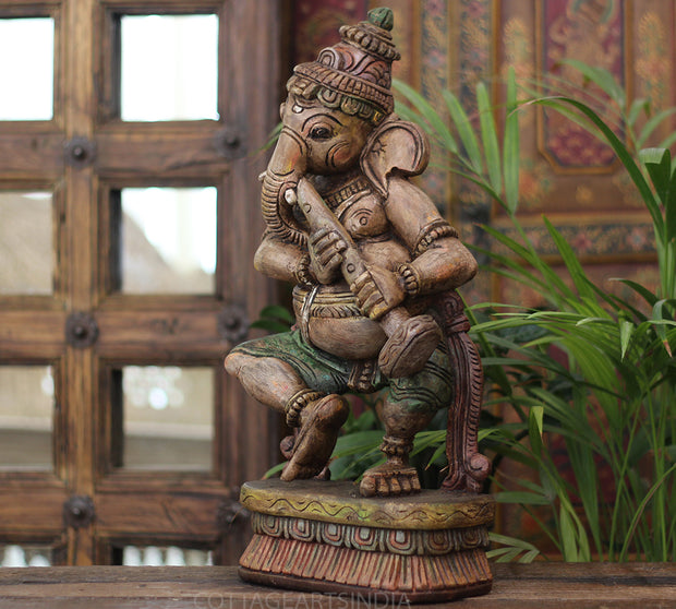 Handcrafted Wooden Lord Ganesha Playing Flute Sculpture – Vintage Antique Finish