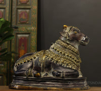 Brass Nandi In Antique Black Finish 17"