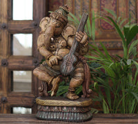 Handcrafted Wooden Lord Ganesha Playing Veena – Vintage Antique Finish