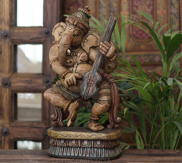 Handcrafted Wooden Lord Ganesha Playing Veena – Vintage Antique Finish