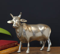 Brass standing cow statue silver finish – handcrafted Kamdhenu idol India
