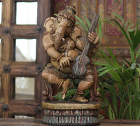 Handcrafted Wooden Lord Ganesha Playing Veena – Vintage Antique Finish