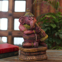 Handcrafted Sitting Wooden Ganesha Playing Shehnai