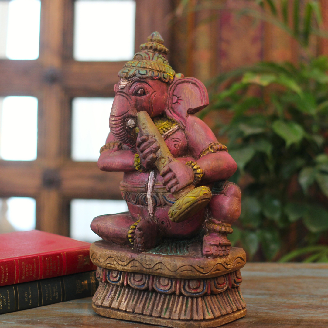 Handcrafted Sitting Wooden Ganesha Playing Shehnai