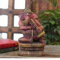 Handcrafted Sitting Wooden Ganesha Playing Shehnai