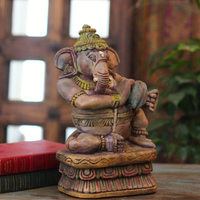 Handcrafted Sitting Wooden Ganesha Playing Manjira