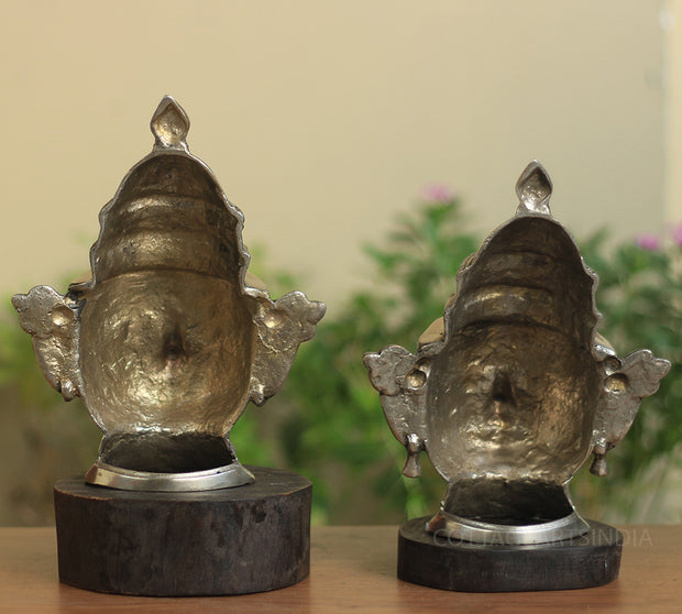 Brass Shiva And Gauri Mukhlingam Mask With Wooden Base