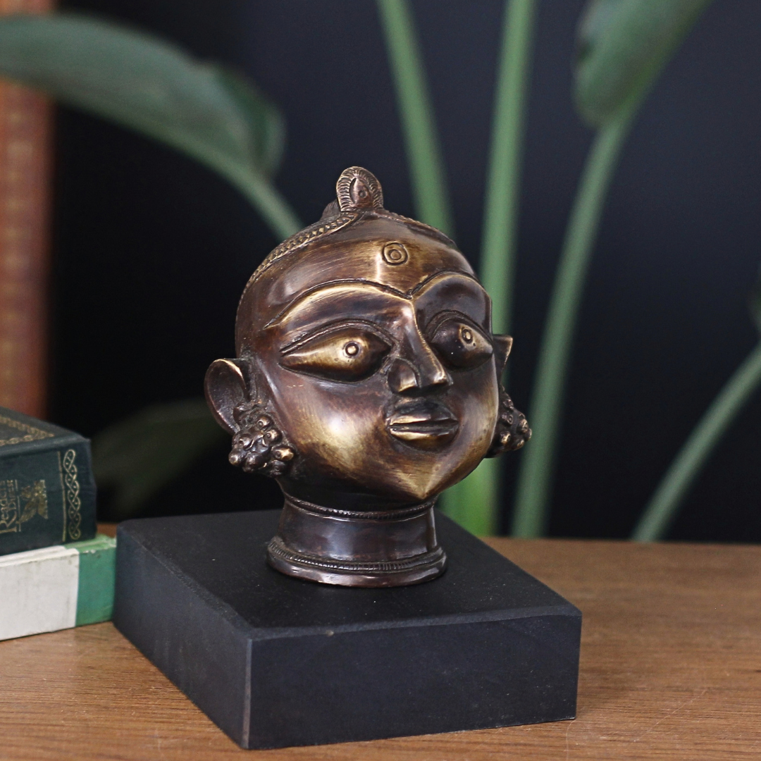Brass Gauri Head Antique Finish on Wooden Stand