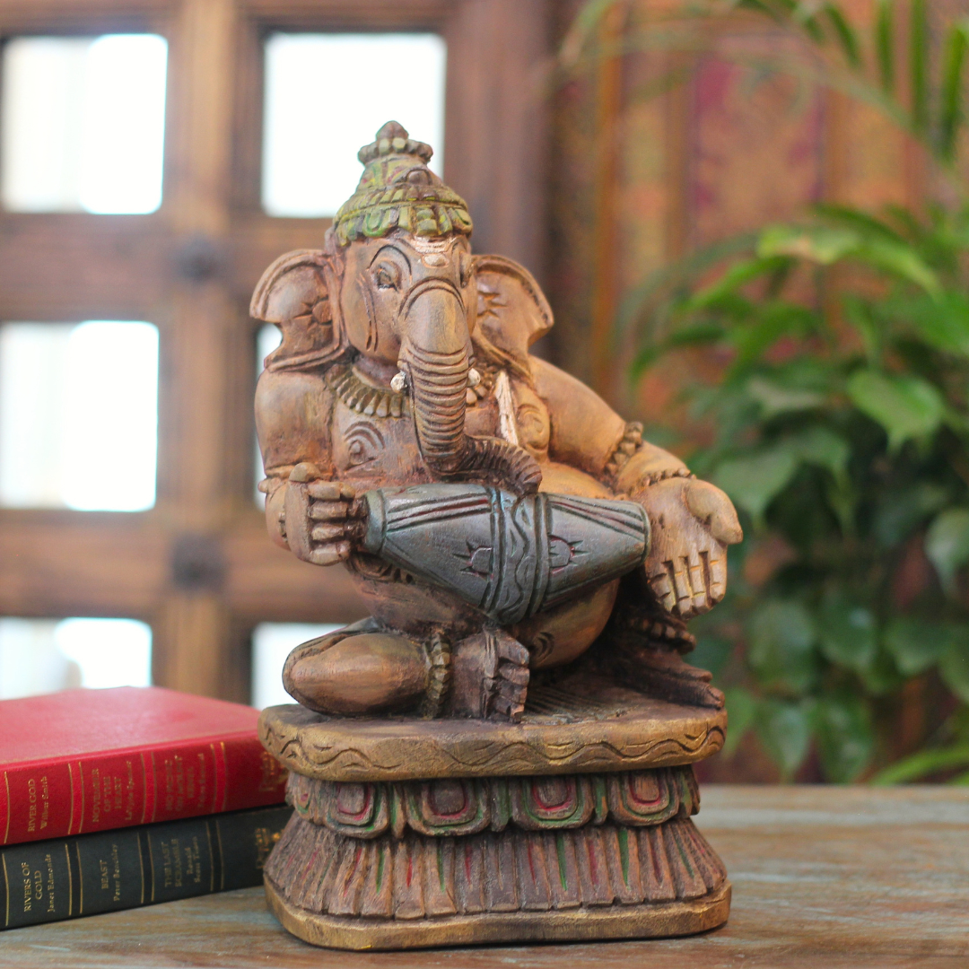 Handcrafted Sitting Wooden Ganesha Playing  Mridangam