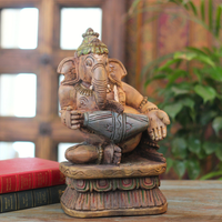 Handcrafted Sitting Wooden Ganesha Playing  Mridangam