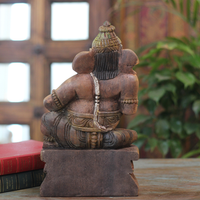 Handcrafted Sitting Wooden Ganesha Playing  Mridangam