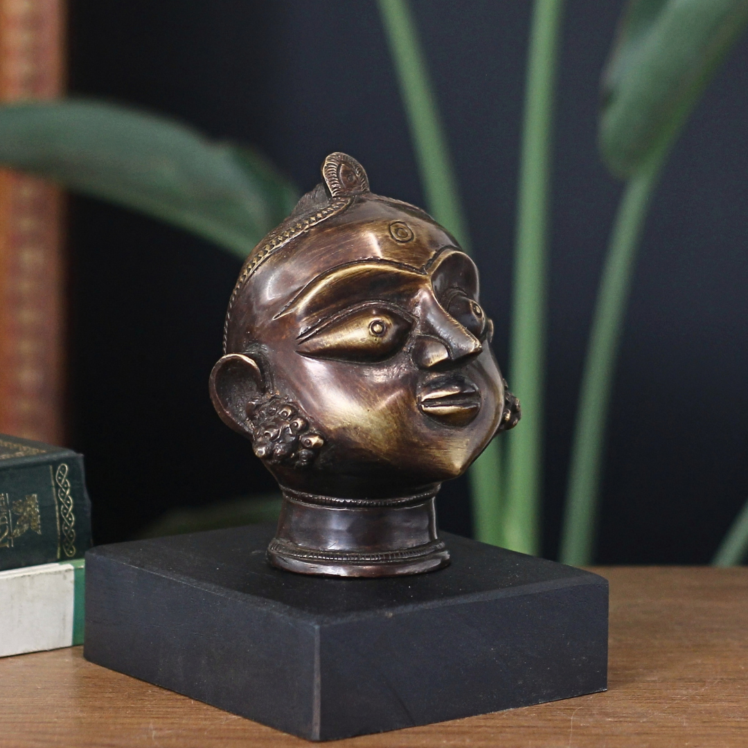 Brass Gauri Head Antique Finish on Wooden Stand