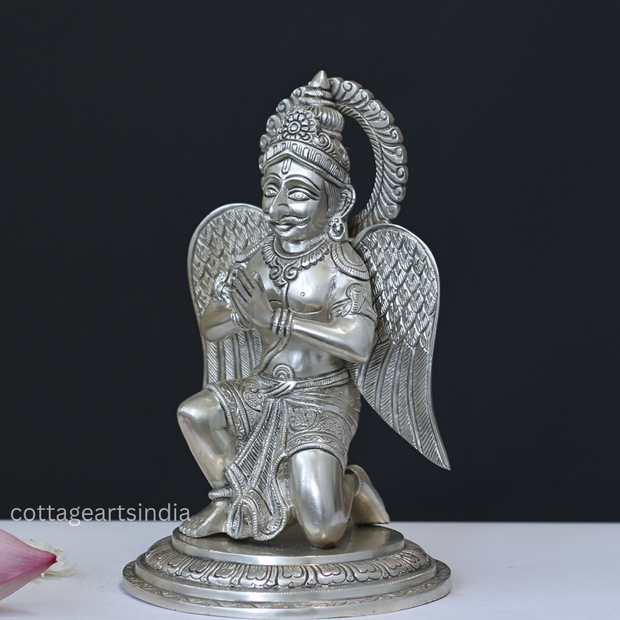 Sitting Brass Garuda in Silver Finish with Folded Hands