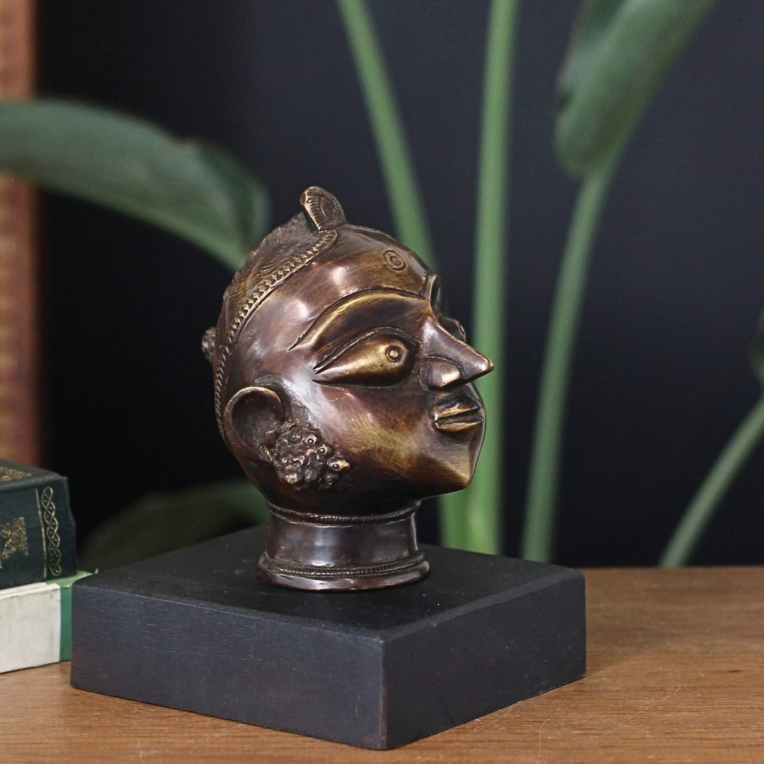 Brass Gauri Head Antique Finish on Wooden Stand