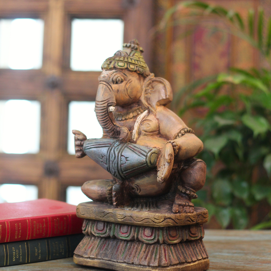 Handcrafted Sitting Wooden Ganesha Playing  Mridangam