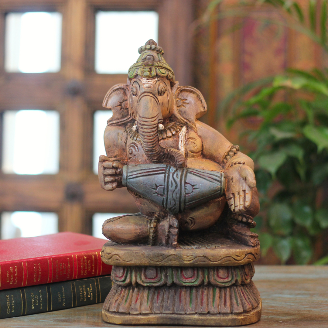 Handcrafted Sitting Wooden Ganesha Playing  Mridangam