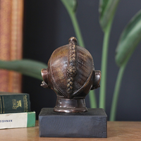 Brass Gauri Head Antique Finish on Wooden Stand