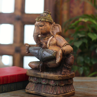 Handcrafted Sitting Wooden Ganesha Playing  Mridangam