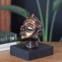 Brass Gauri Head Antique Finish on Wooden Stand