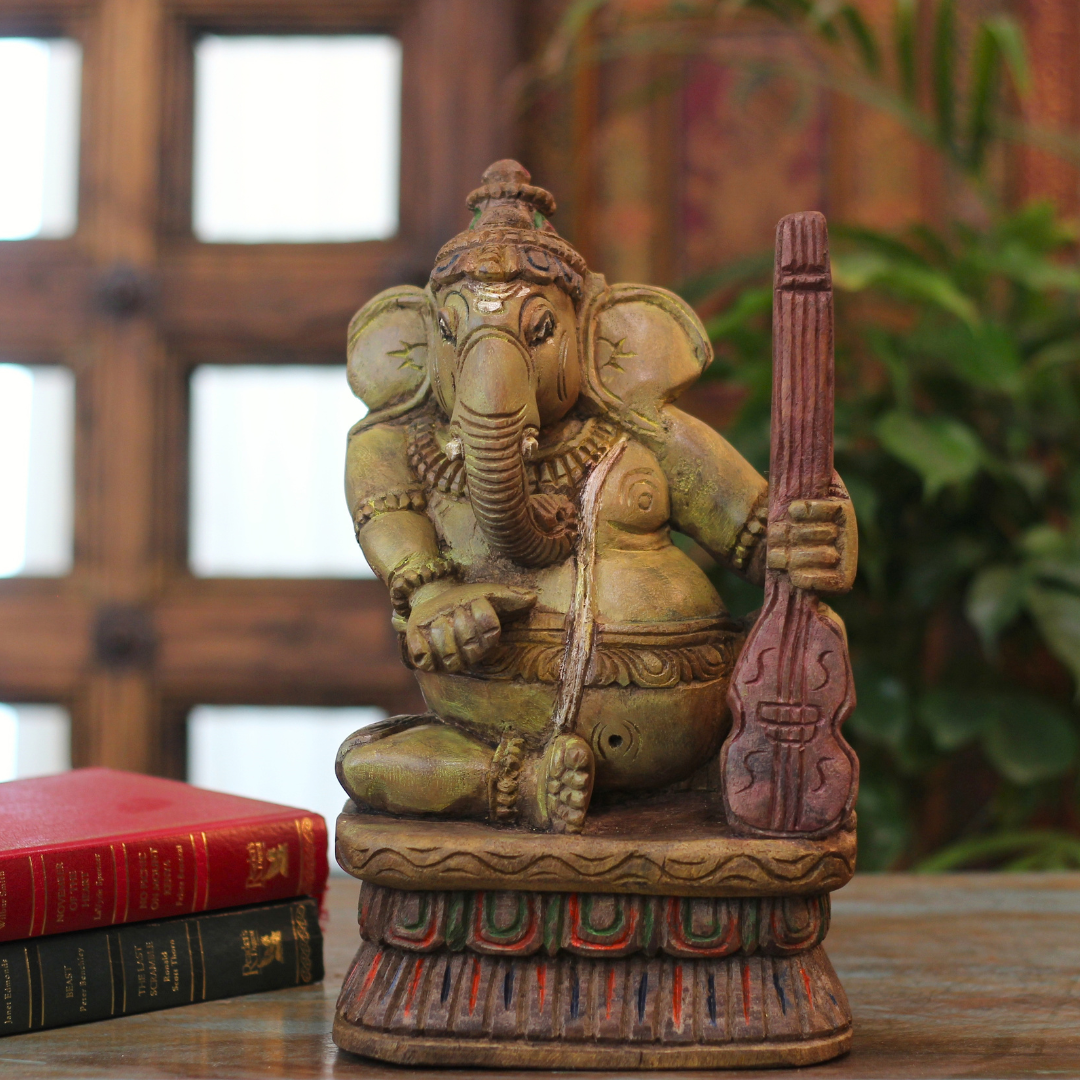 Handcrafted Sitting Wooden Ganesha Playing Violin