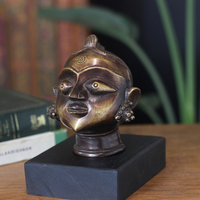 Brass Gauri Head Antique Finish on Wooden Stand