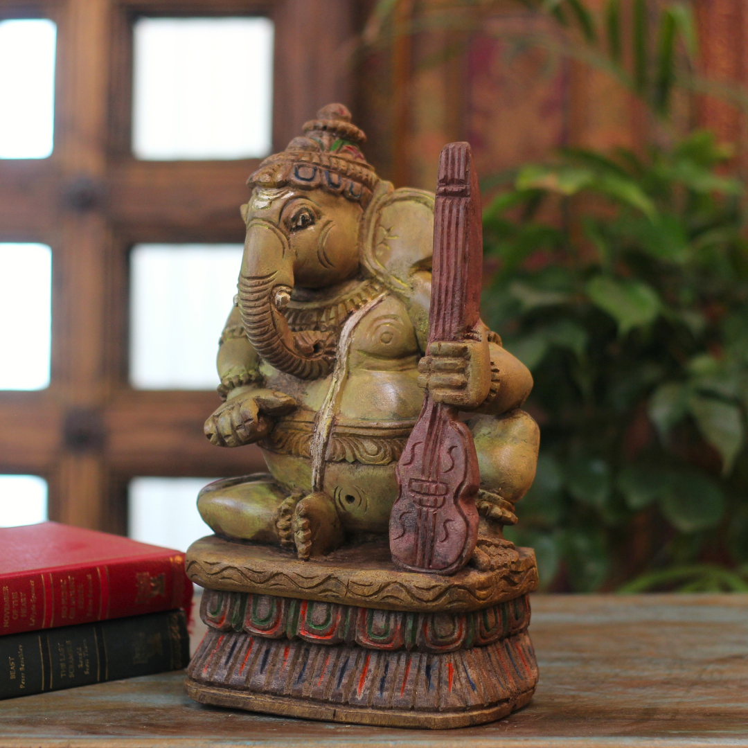 Handcrafted Sitting Wooden Ganesha Playing Violin