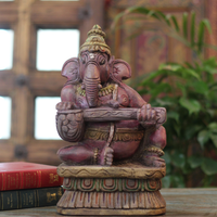 Handcrafted Sitting Wooden Ganesha Playing Veena