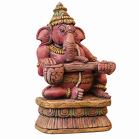 Handcrafted Sitting Wooden Ganesha Playing Veena