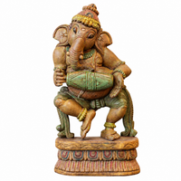 Handcrafted Wooden Ganesha Playing Mridangam | Cottage Arts