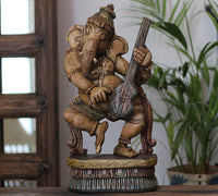 Handcrafted Wooden Lord Ganesha Playing Veena – Vintage Antique Finish