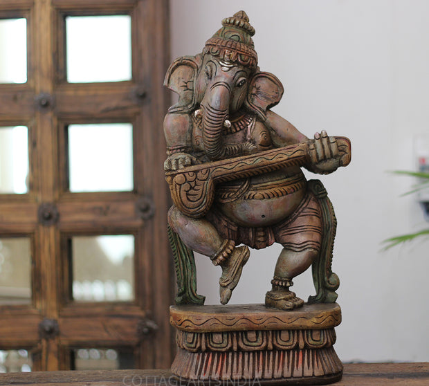 Handcrafted Wooden Lord Ganesha Playing Veena – Vintage Antique Finish