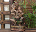 Handcrafted Wooden Lord Ganesha Playing Flute Sculpture – Vintage Antique Finish