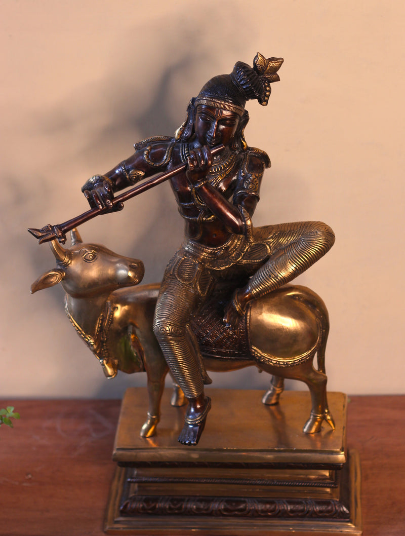 Brass Krishna Sitting On Cow 21”