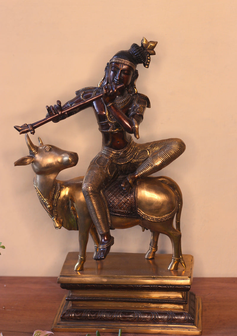 Brass Krishna Sitting On Cow 21”