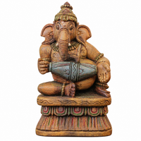 Handcrafted Sitting Wooden Ganesha Playing  Mridangam