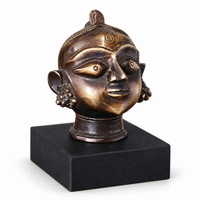 Brass Gauri Head Antique Finish on Wooden Stand
