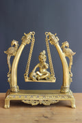 Brass Krishna on Swing