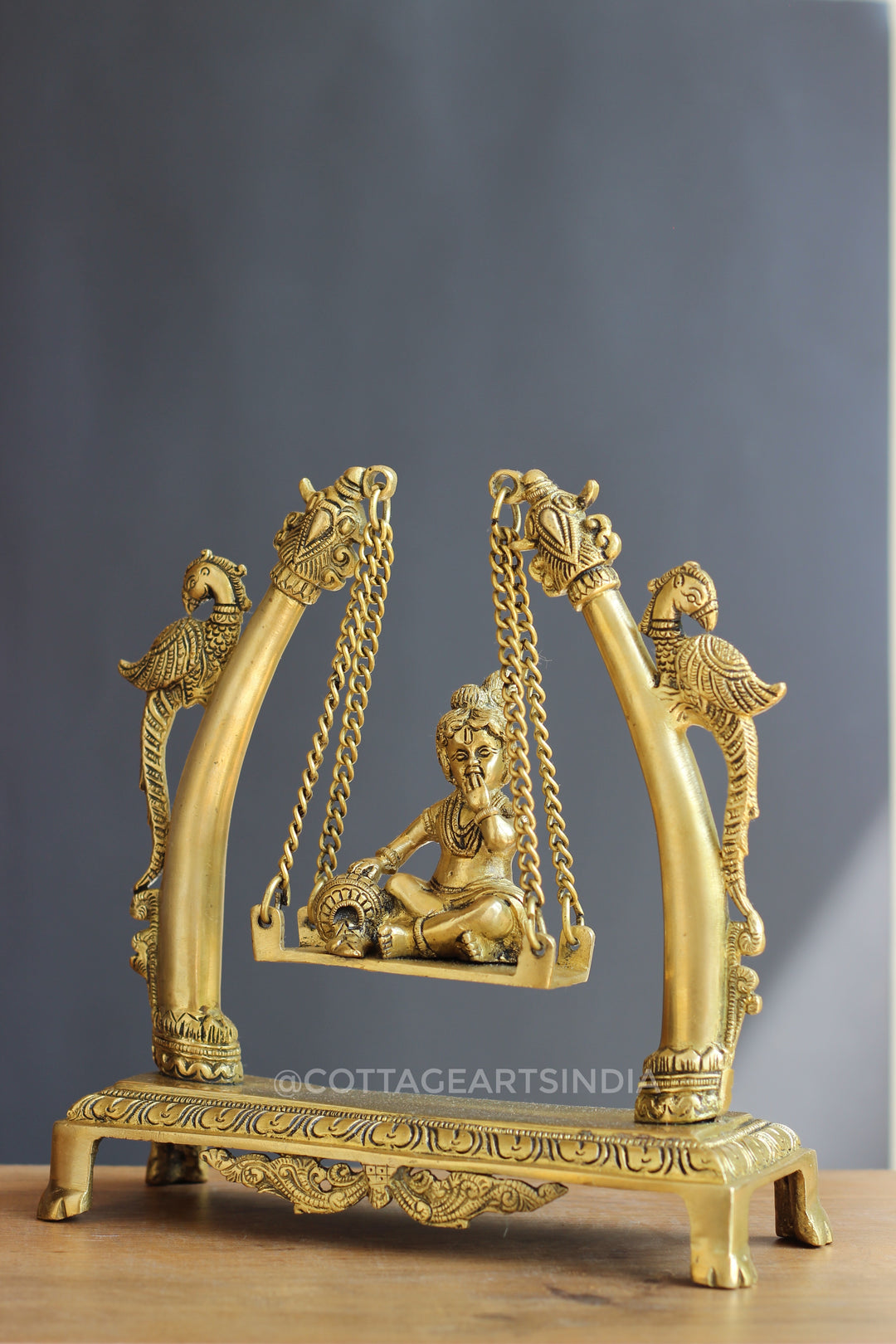 Brass Krishna on Swing