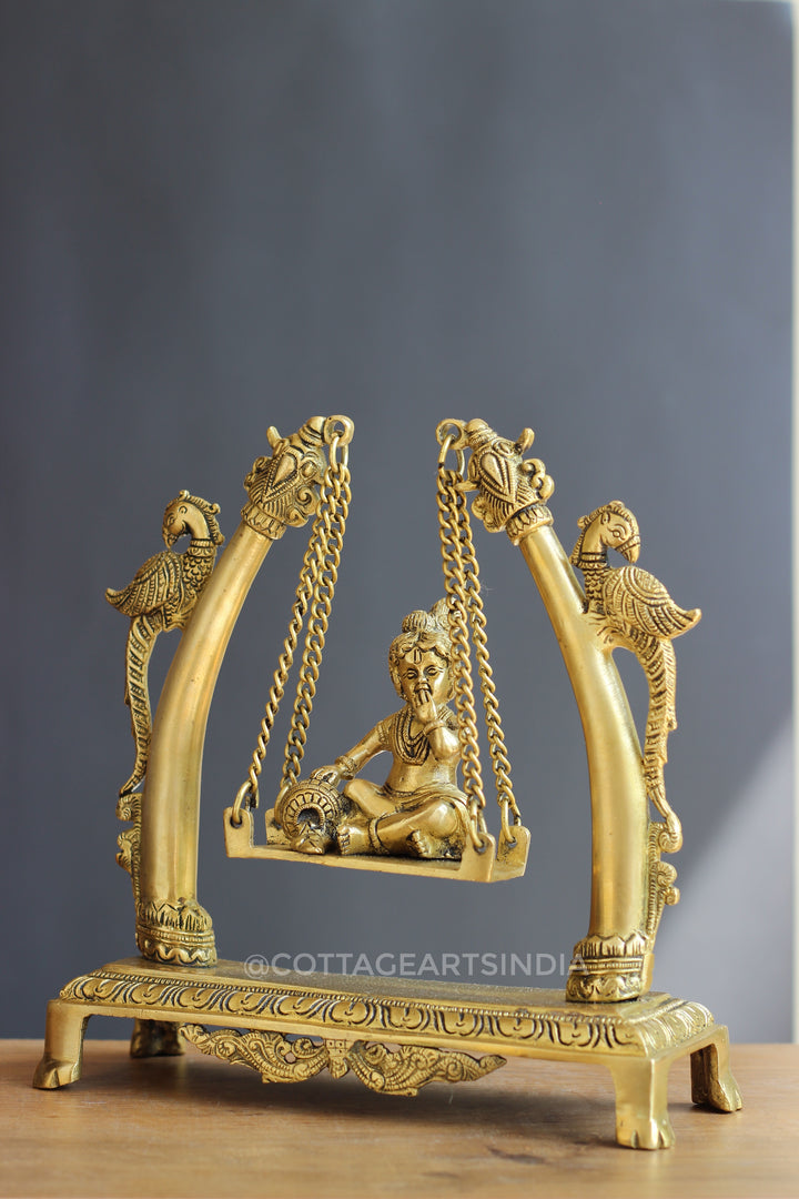 Brass Krishna on Swing