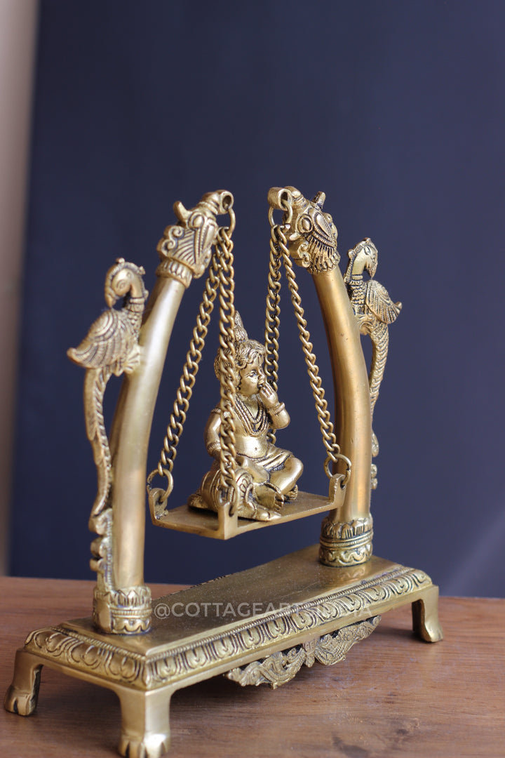 Brass Krishna on Swing